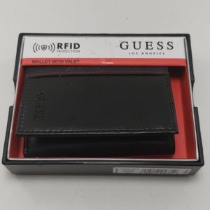 ****SOLD**** Tri-fold wallet by Guess